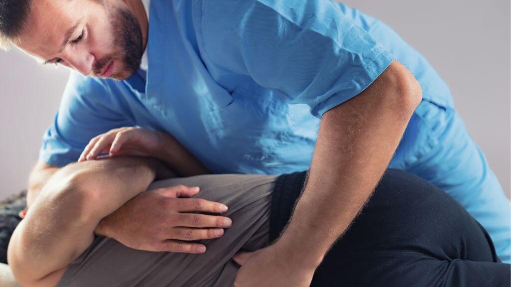 chiropractor performing adjustment